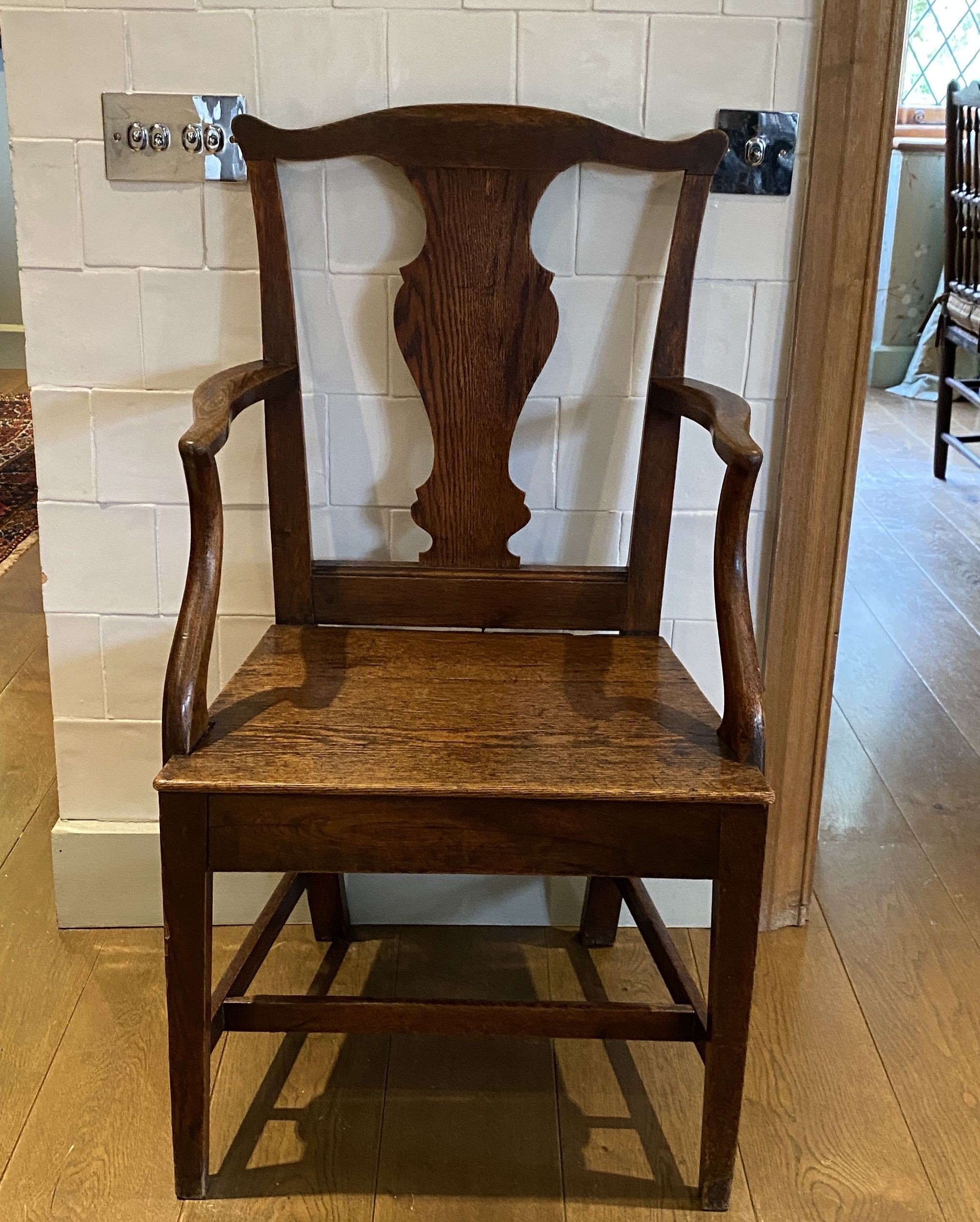 A George III oak cottage dining chair, with solid splat and seat